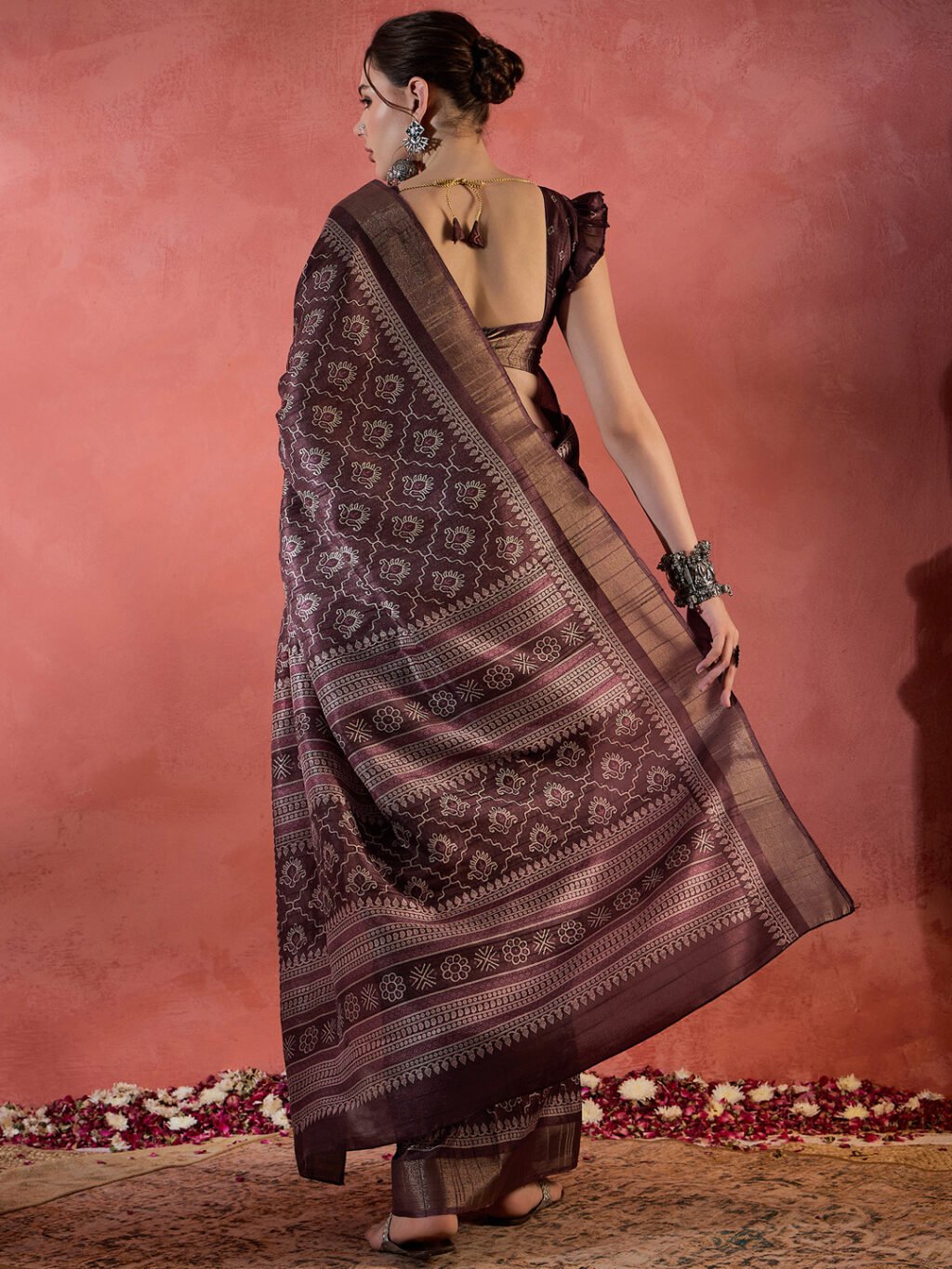 showcasing the beauty and craftsmanship of Designer Saree.
