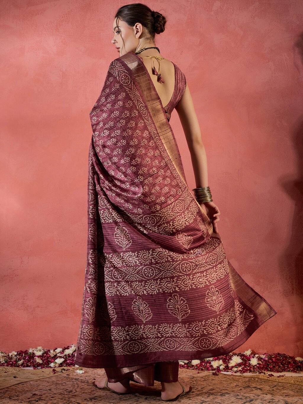 showcasing the beauty and craftsmanship of Designer Saree.
