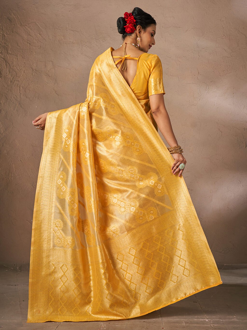 showcasing the beauty and craftsmanship of Traditional Saree.
