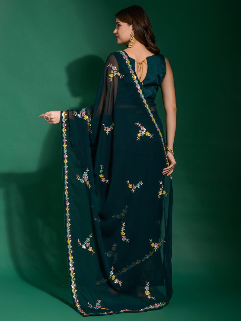 showcasing the beauty and craftsmanship of Party Wear Saree.