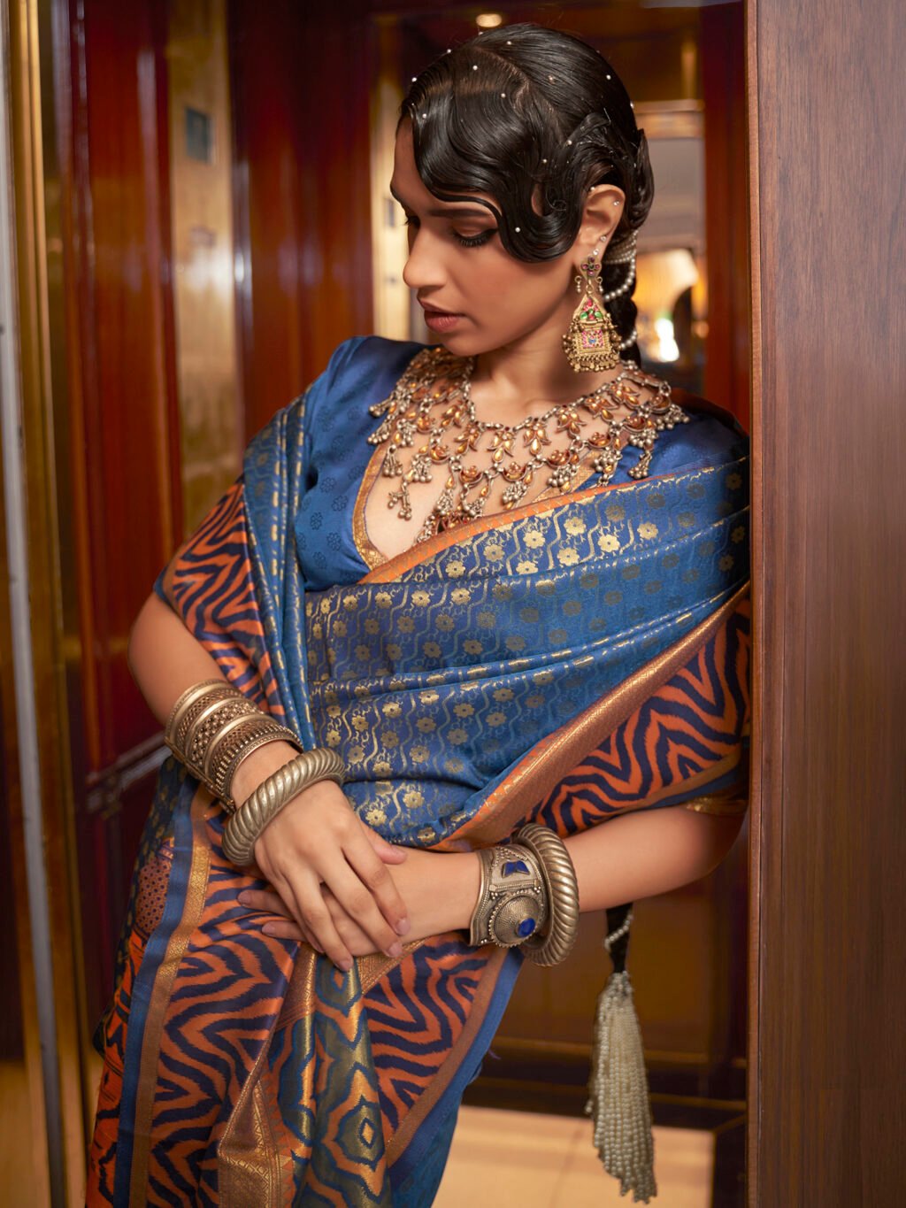 showcasing the beauty and craftsmanship of Party Wear Saree.