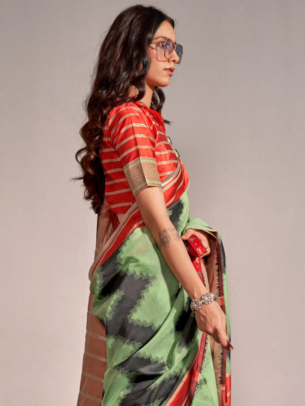showcasing the beauty and craftsmanship of Designer Saree.
