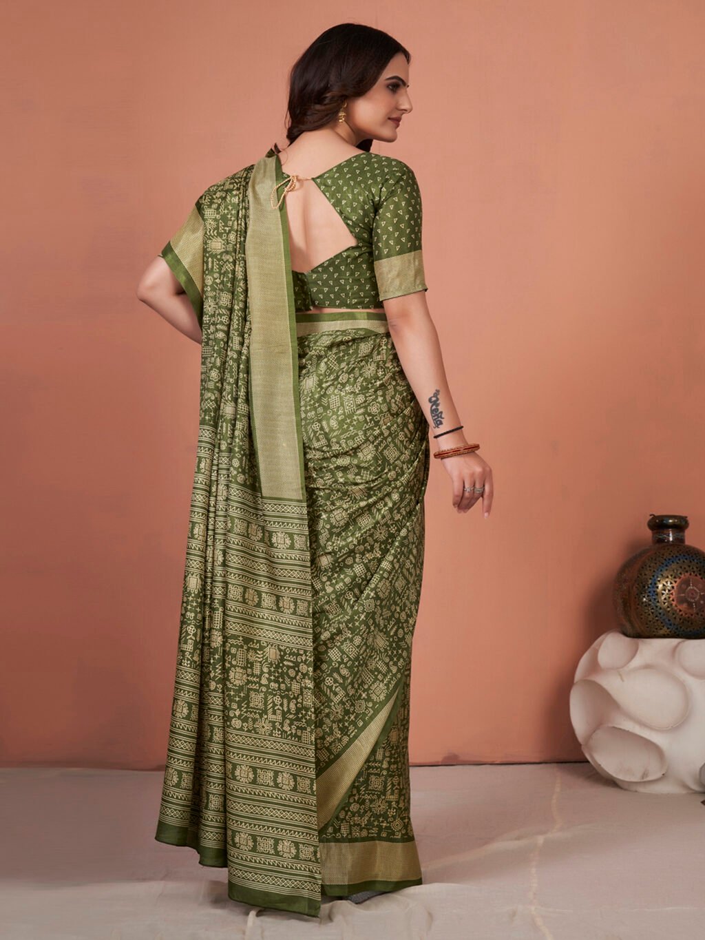 showcasing the beauty and craftsmanship of Silk Saree.