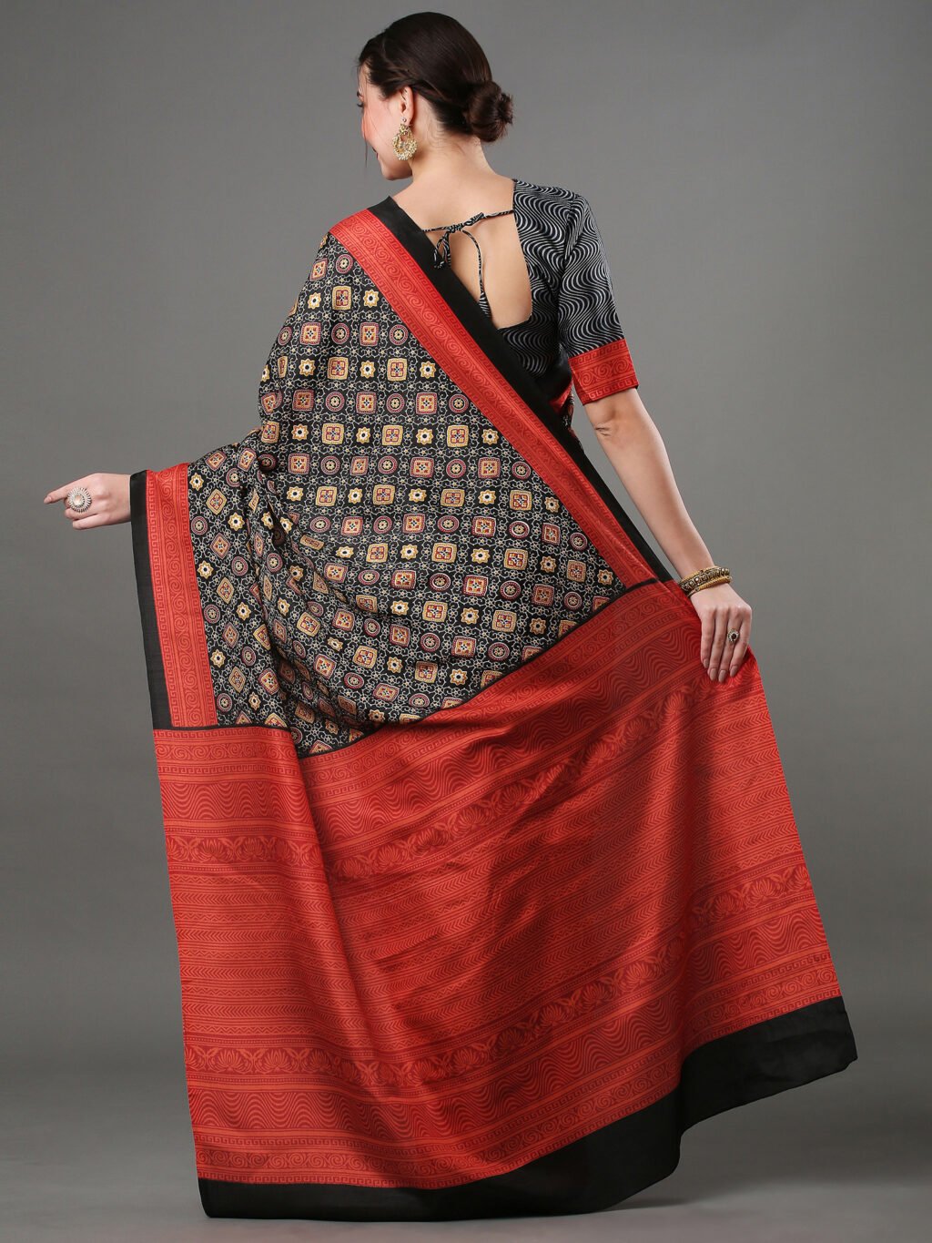 showcasing the beauty and craftsmanship of Designer Saree.