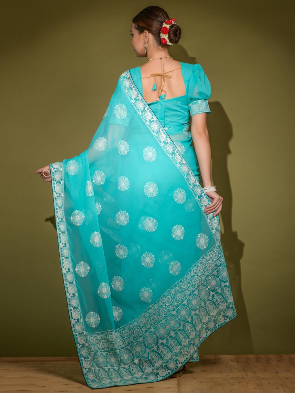 showcasing the beauty and craftsmanship of Designer Saree.
