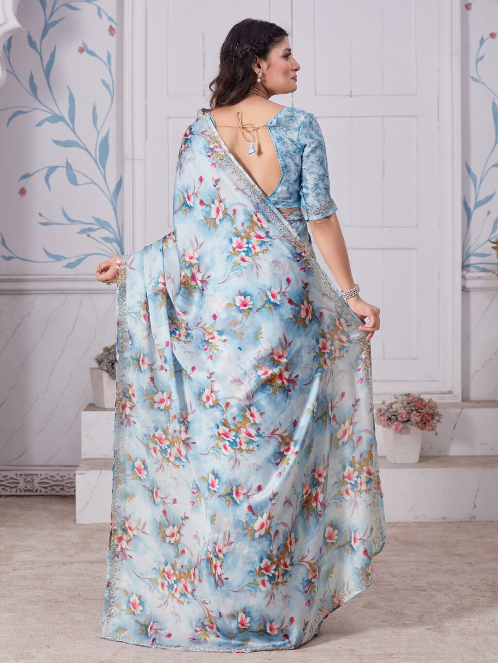 showcasing the beauty and craftsmanship of Festive Saree.