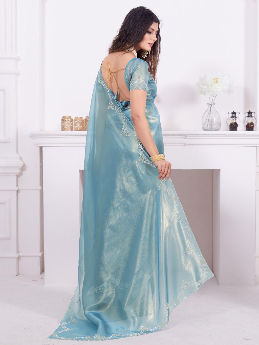 showcasing the beauty and craftsmanship of Party Wear Saree.