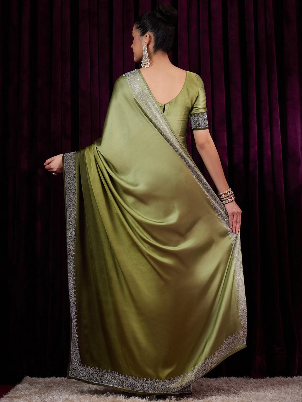 showcasing the beauty and craftsmanship of Designer Saree.