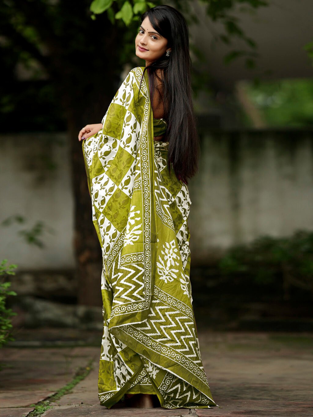 showcasing the beauty and craftsmanship of Designer Saree.