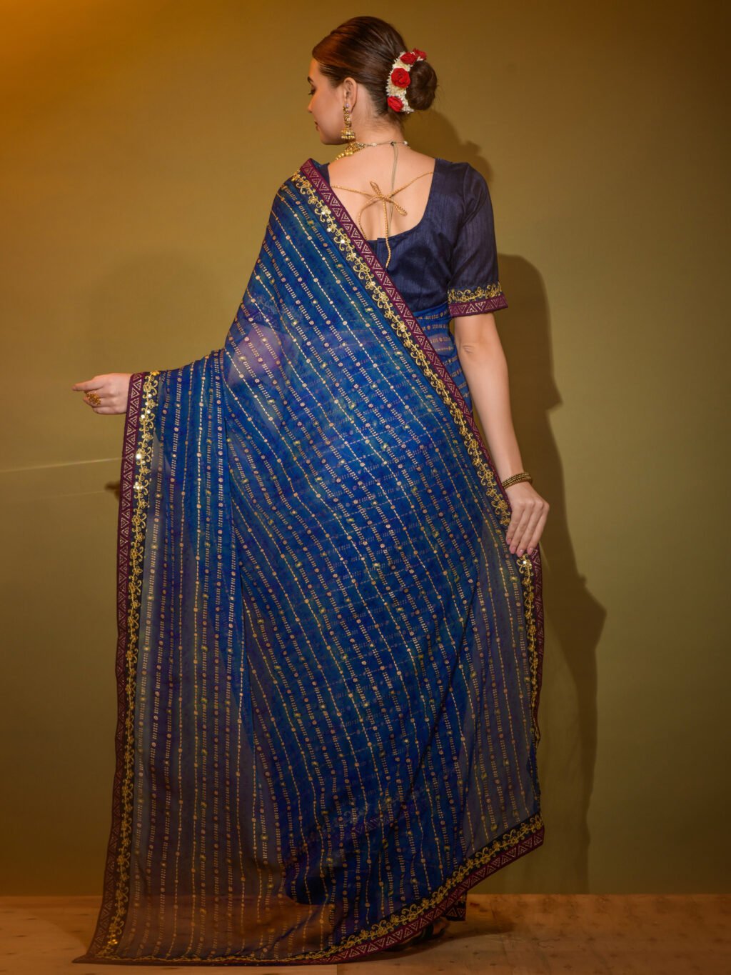 showcasing the beauty and craftsmanship of Festive Saree.