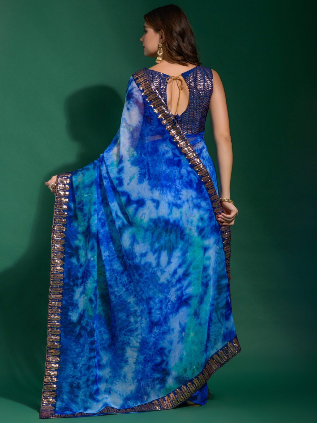 showcasing the beauty and craftsmanship of Designer Saree.