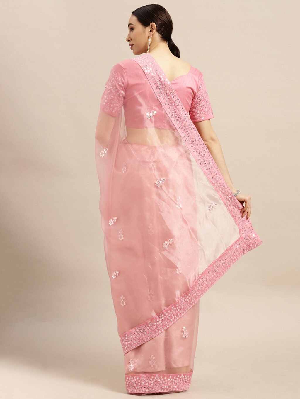 showcasing the beauty and craftsmanship of Designer Saree.