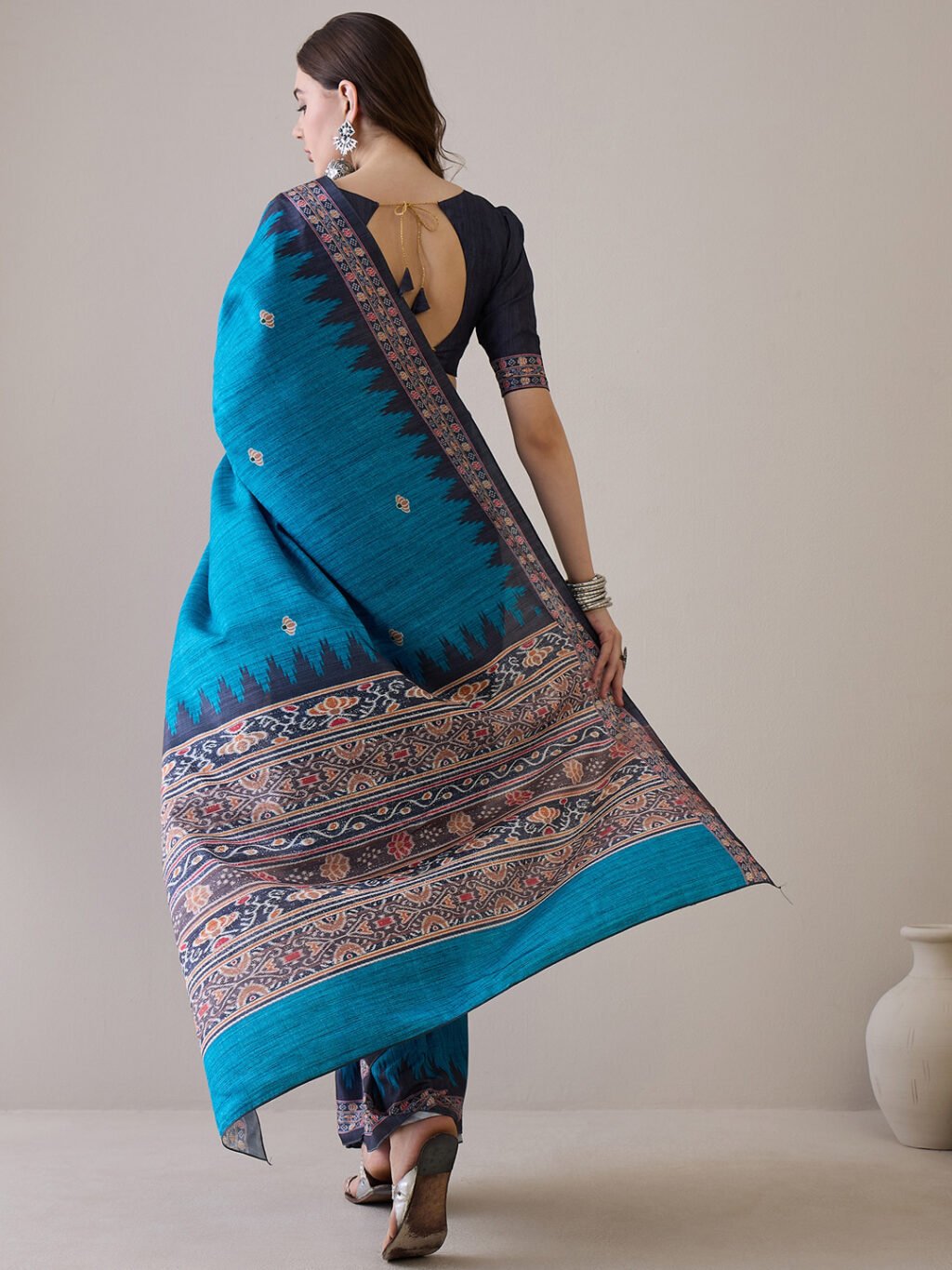 showcasing the beauty and craftsmanship of Festive Saree.