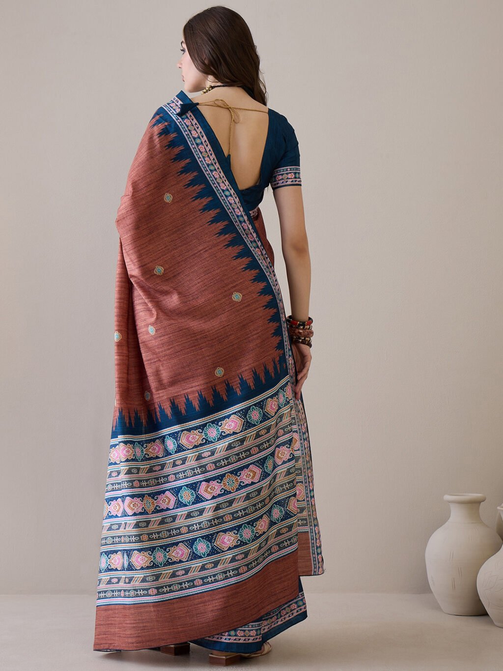 showcasing the beauty and craftsmanship of Designer Saree.