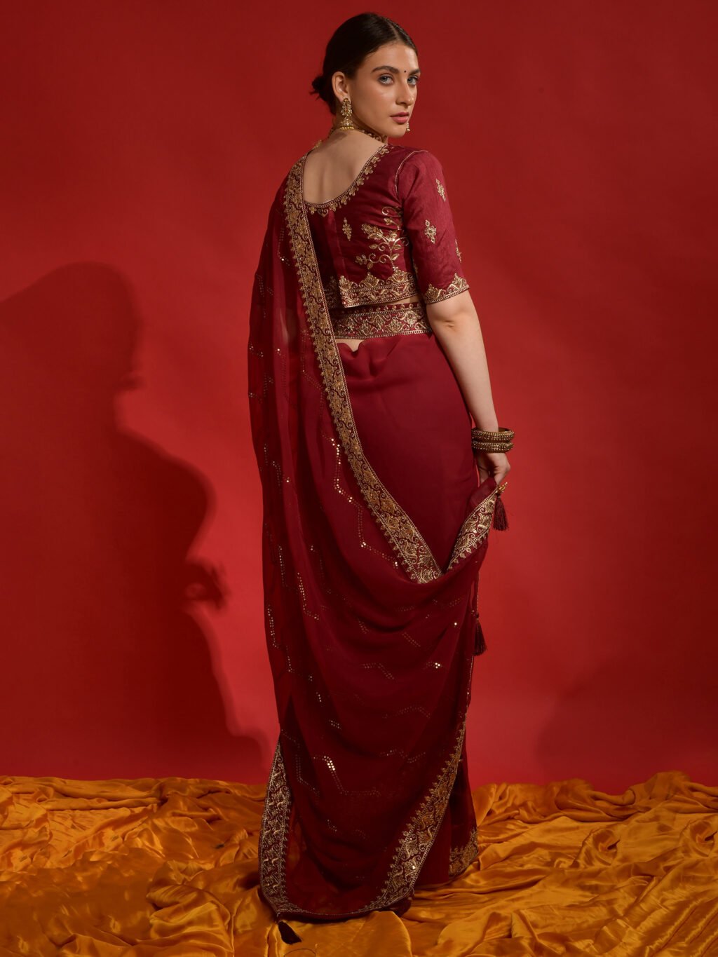 showcasing the beauty and craftsmanship of Designer Saree.
