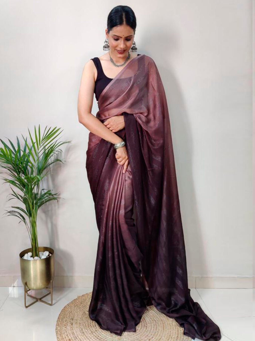 showcasing the beauty and craftsmanship of Designer Saree.
