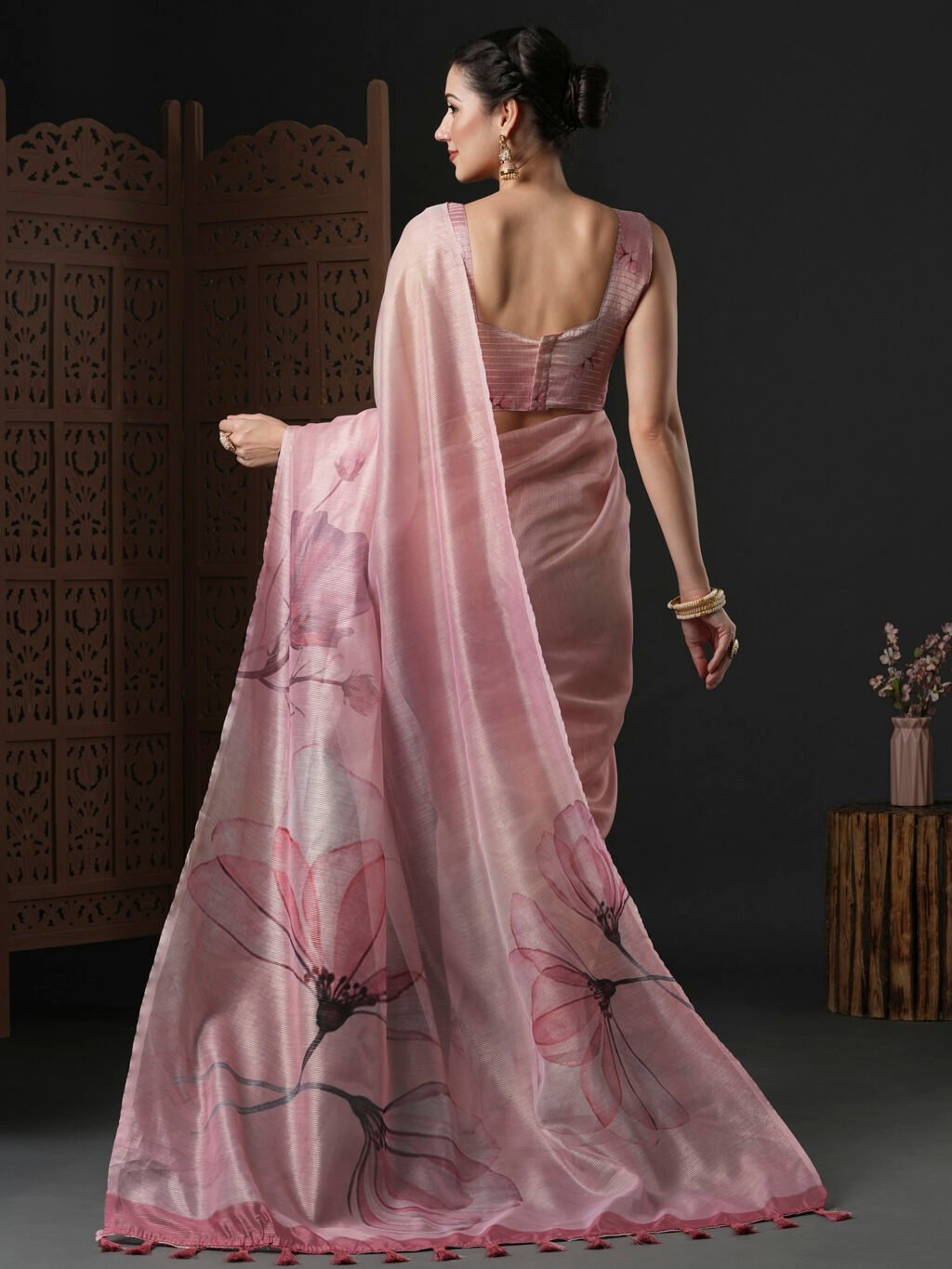 showcasing the beauty and craftsmanship of Party Wear Saree.