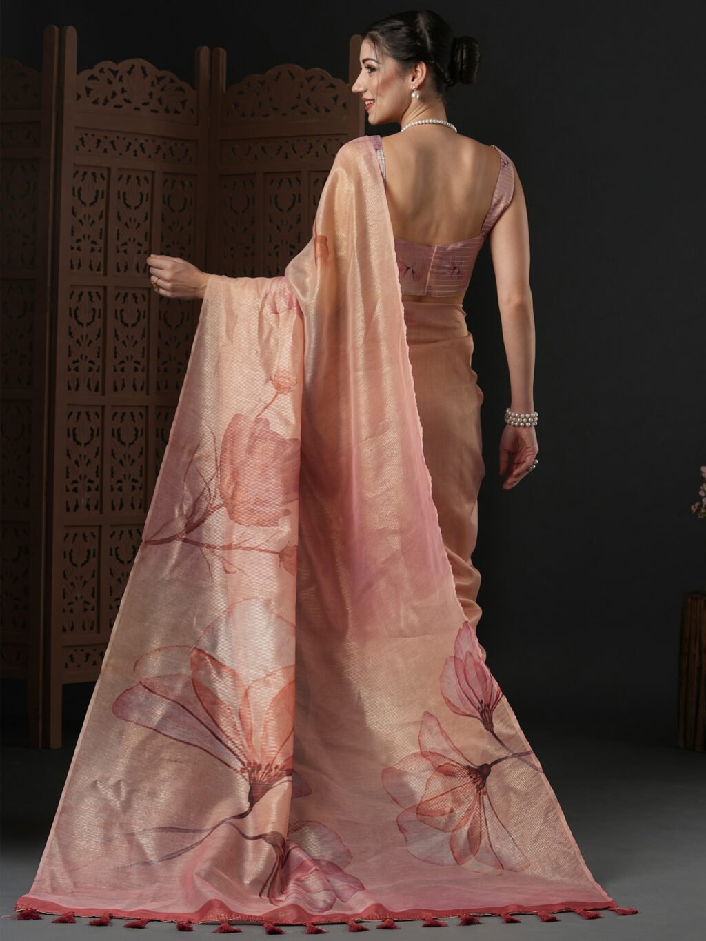 showcasing the beauty and craftsmanship of Designer Saree.