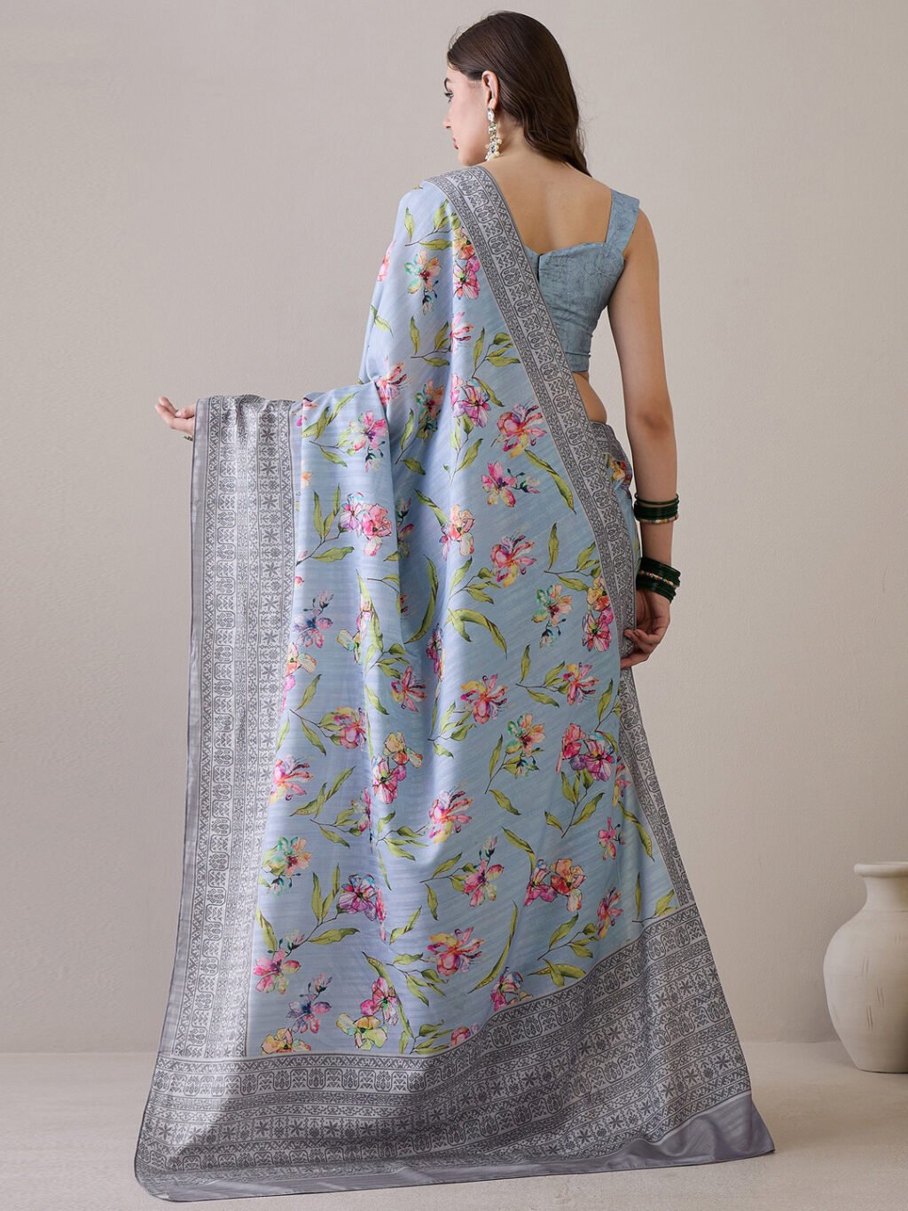 showcasing the beauty and craftsmanship of Designer Saree.