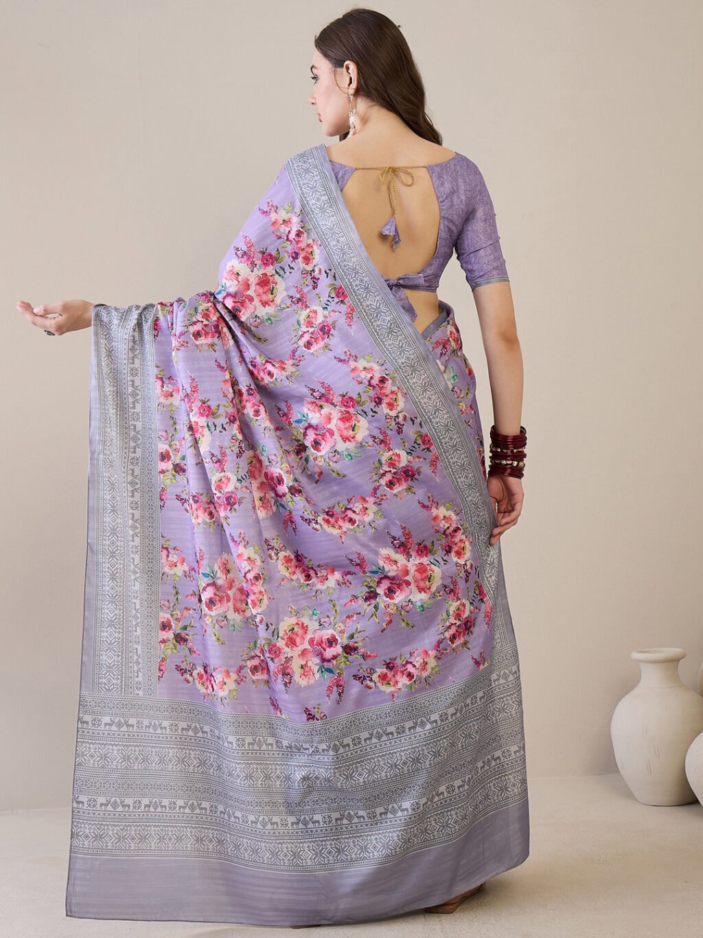 showcasing the beauty and craftsmanship of Designer Saree.
