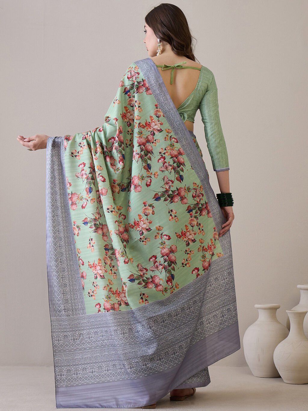 showcasing the beauty and craftsmanship of Designer Saree.