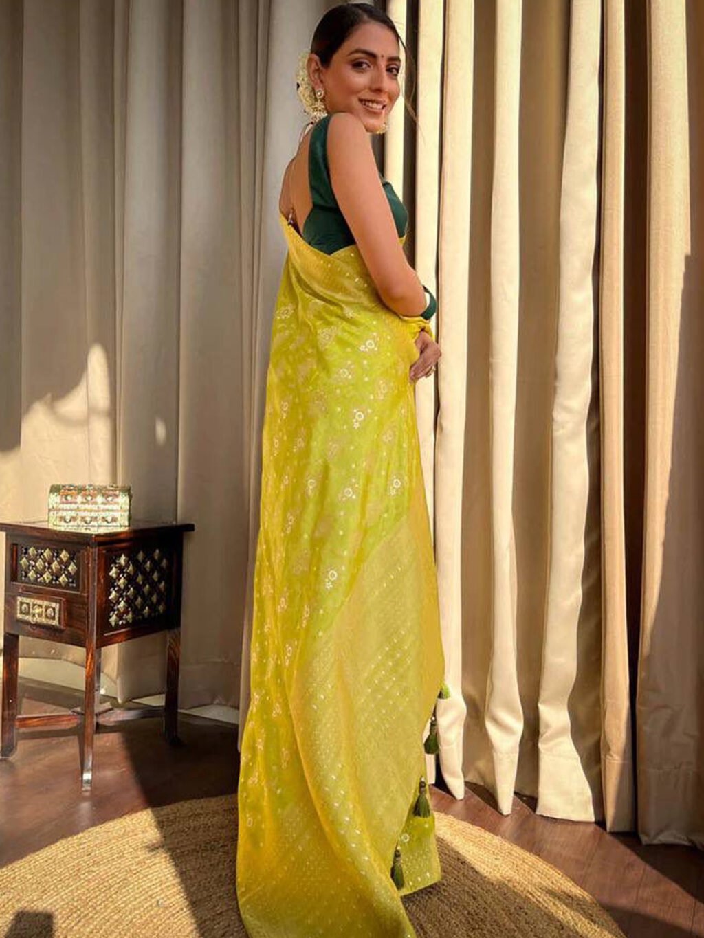 showcasing the beauty and craftsmanship of Designer Saree.