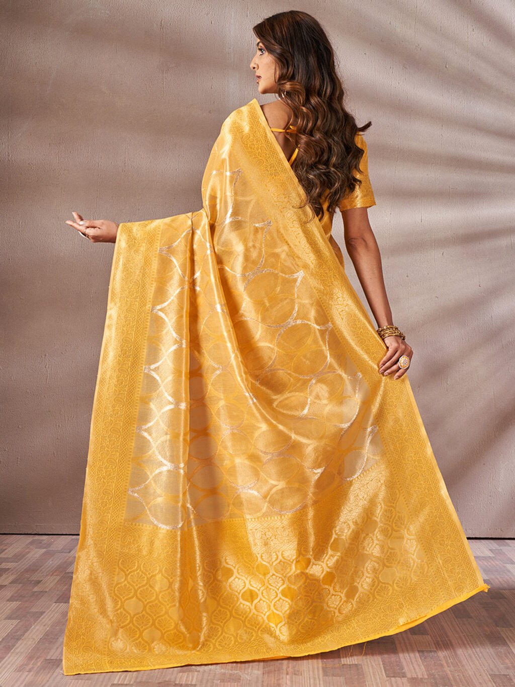 showcasing the beauty and craftsmanship of Party Wear Saree.