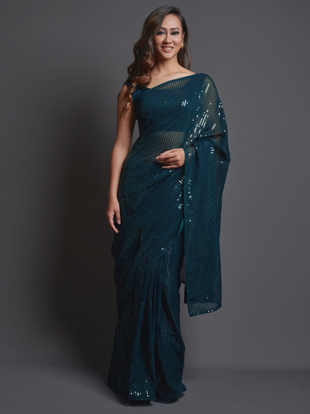 Image of Teal Blue Georgette Saree