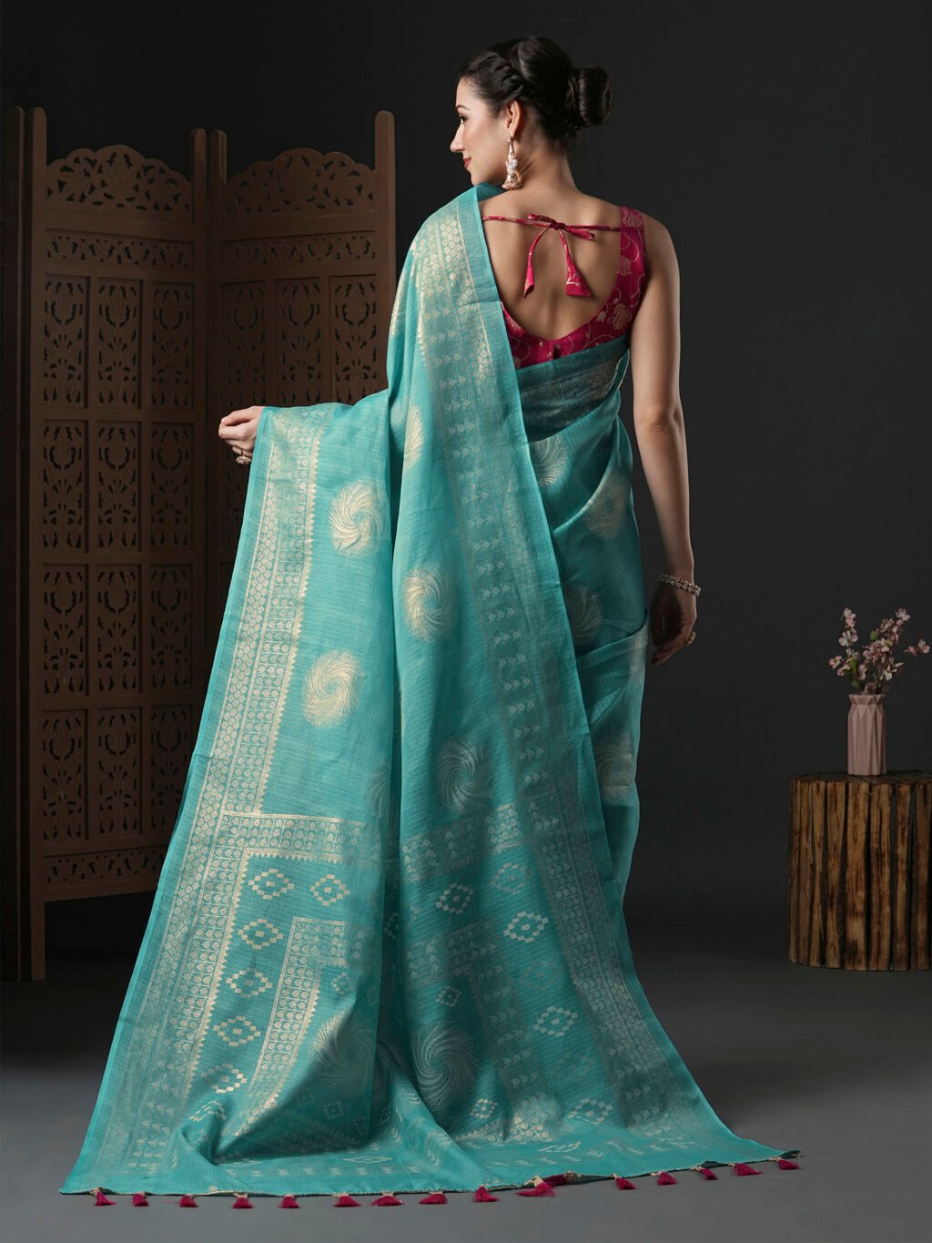 showcasing the beauty and craftsmanship of Designer Saree.
