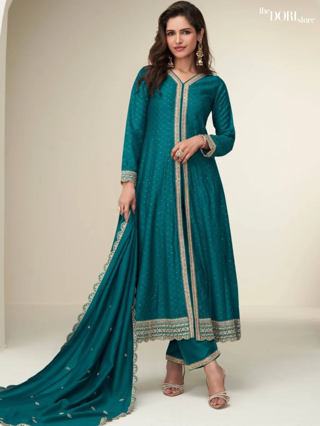 Shop Teal Blue Shimmer Silk Partywear Suit with its intricate design