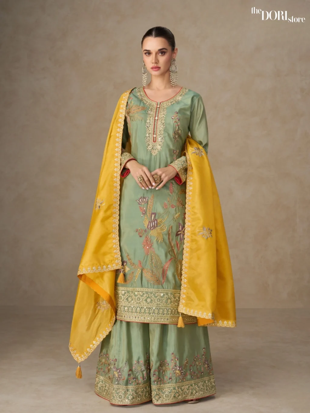 Shop Pista Green Partywear Shimmer Silk Suit with its intricate design
