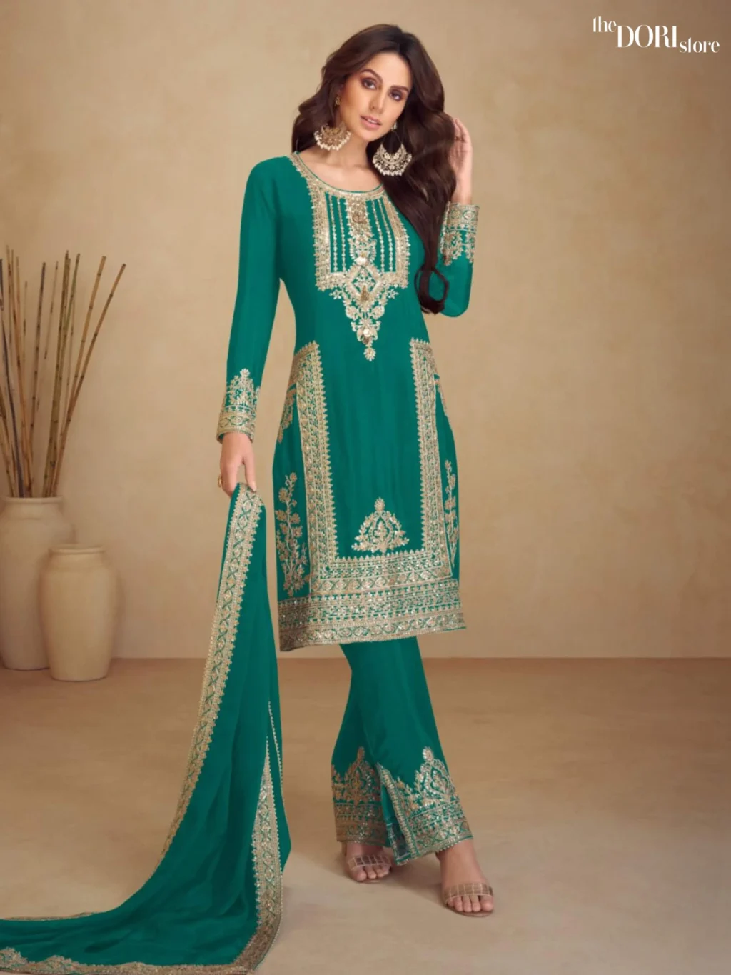 Shop Readymade Aqua Green Partywear Chinon Suit with its intricate design
