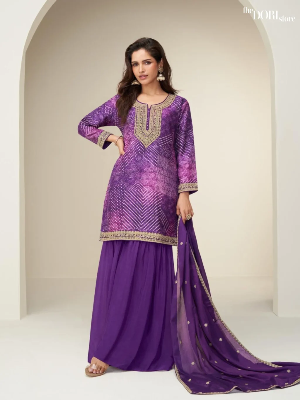 Shop Plum Purple Readymade Chinon Silk Suit with its intricate design